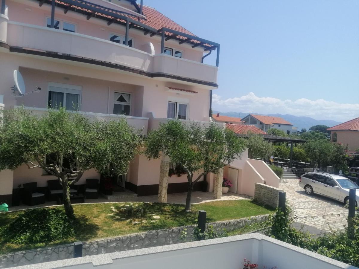 Apartmani Simon Lopar Esterno foto
